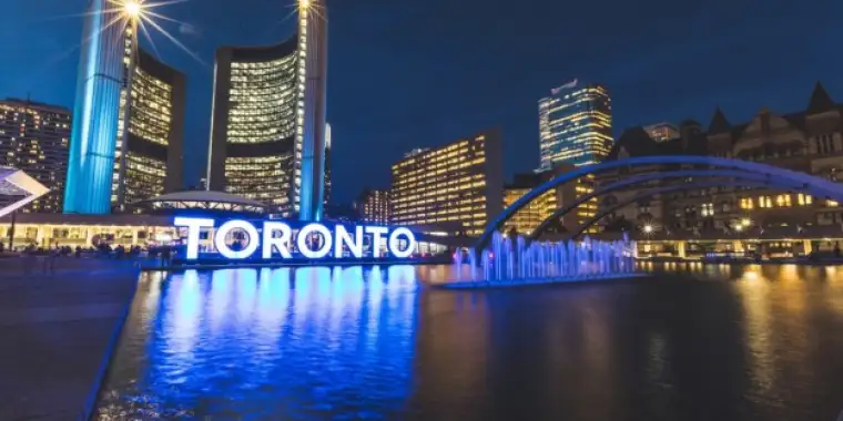Nathan Phillips square in Toronto at night
