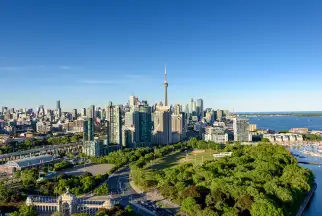 Toronto skyline featuring the iconic CN Tower and Ontario Lake