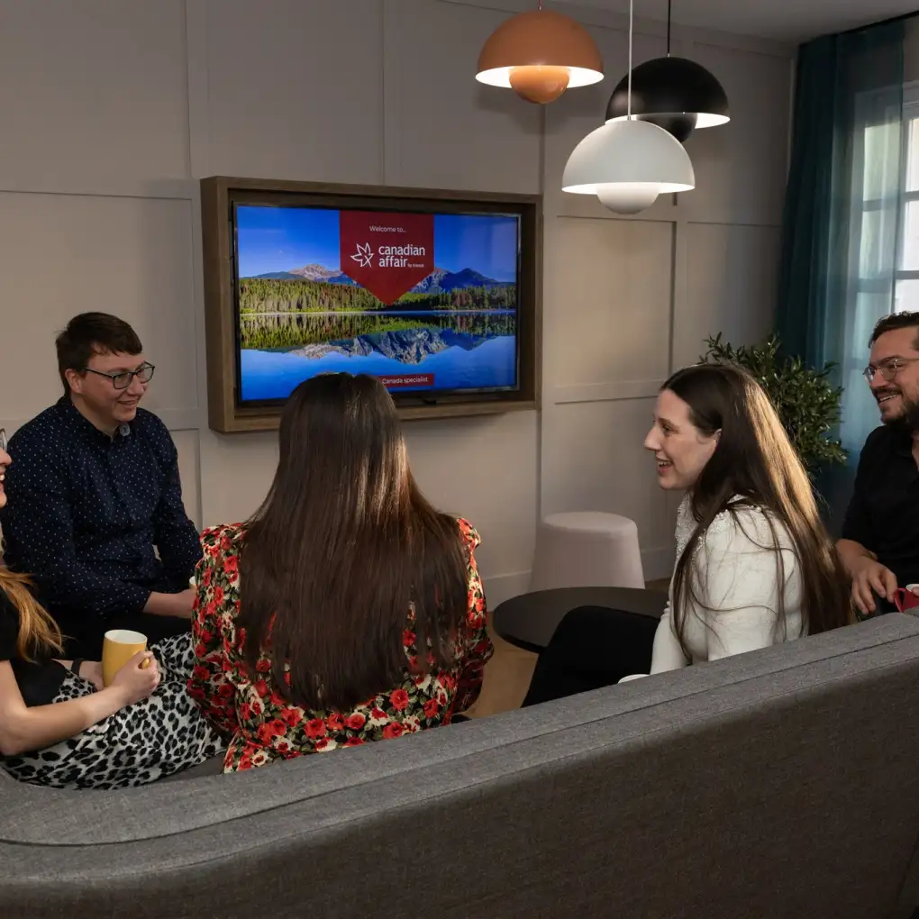 Canadian Affair travel experts chatting lively with each other