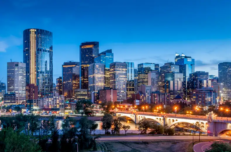 istock-481574937_calgary_skyline_night_bow_river_and_centre_street_bridge_calgary_alberta.jpg