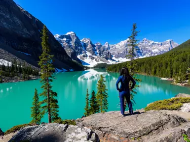 Woman looks out over Peyto Lake in the Canadian Rockies
