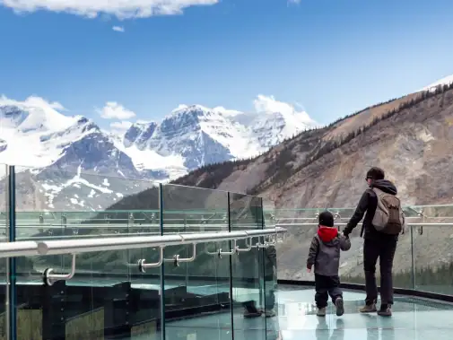 website-banner-mother-and-son-waking-on-columbia-icefield--skywalk-during-summer-in-jasper-national-park---1294349547.jpg