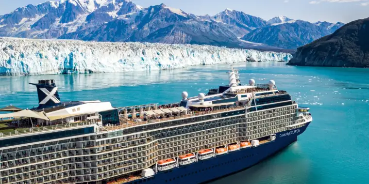 Celebrity Cruise ship sails near a glacier
