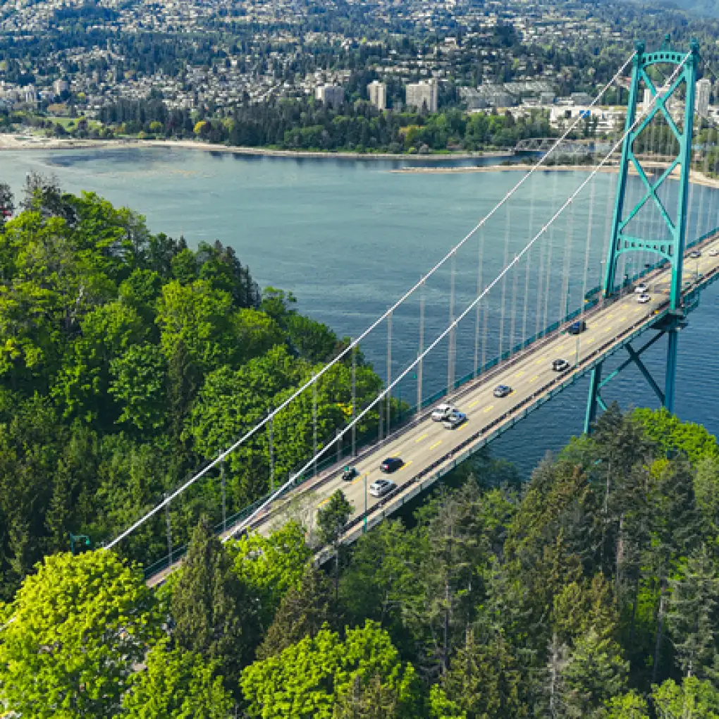 cars drive over a bridge in Thousand Islands National Park, Canada